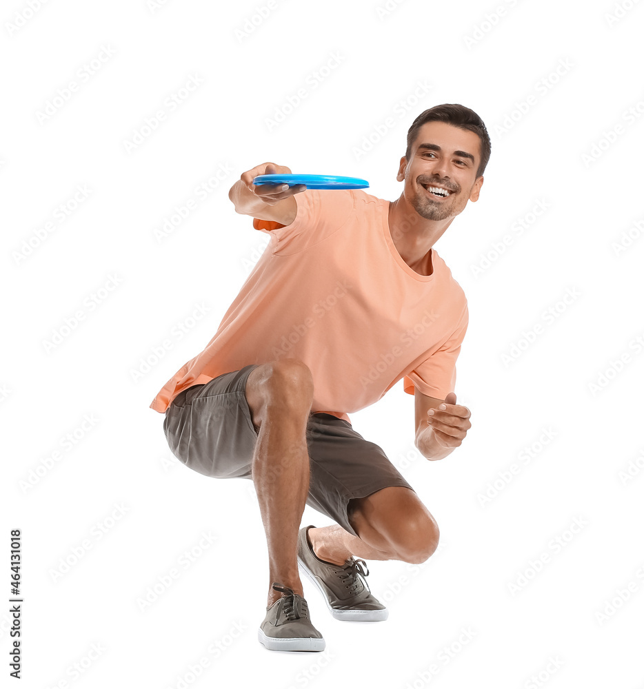 Young man throwing frisbee on white background