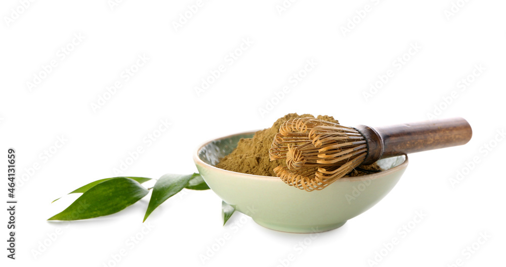 Bowl with natural hojicha powder and chasen on white background