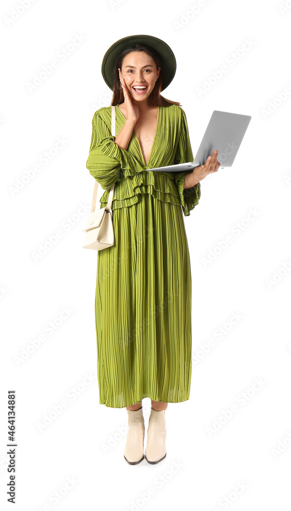 Happy young woman with laptop on white background. Black Friday sale