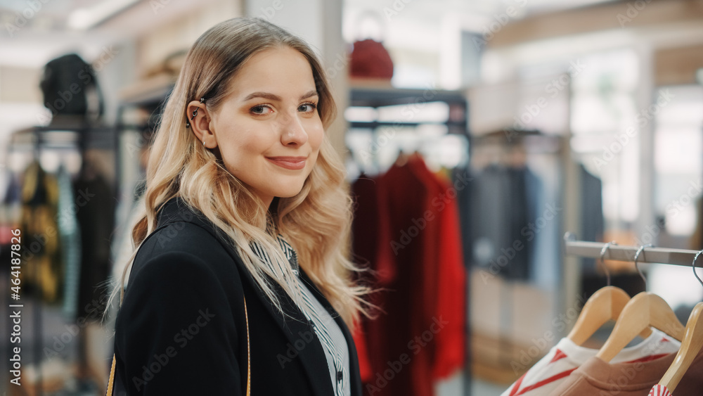 Beautiful Smiling Female Customer Shopping in Clothing Store, Choosing Stylish Clothes, Blouse, Shir