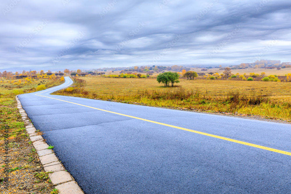 Empty asphalt road pavement and sky clouds on a cloudy day.Road ground scene after rain.