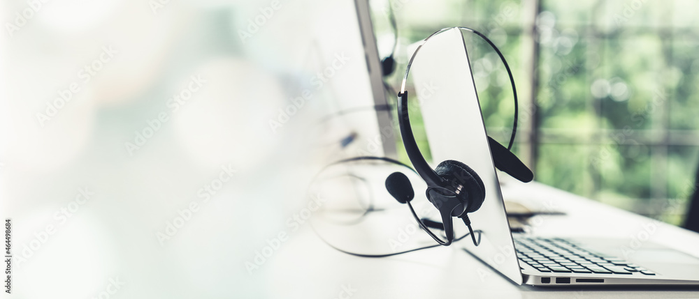 Headset and customer support equipment at call center ready for actively service . Corporate busines