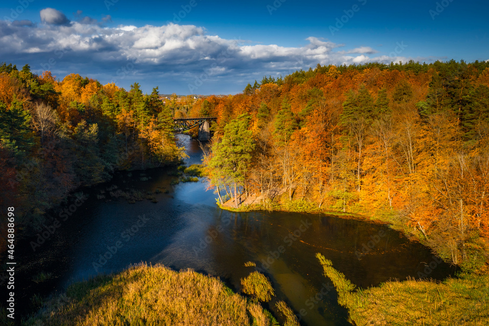 Autumnal scenery and the railway bridge in Rutki, Kashubia. Poland