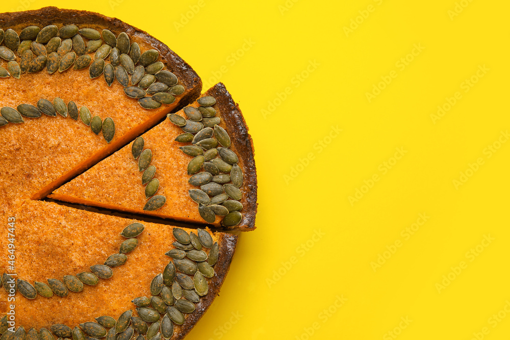 Delicious pumpkin pie on yellow background, closeup