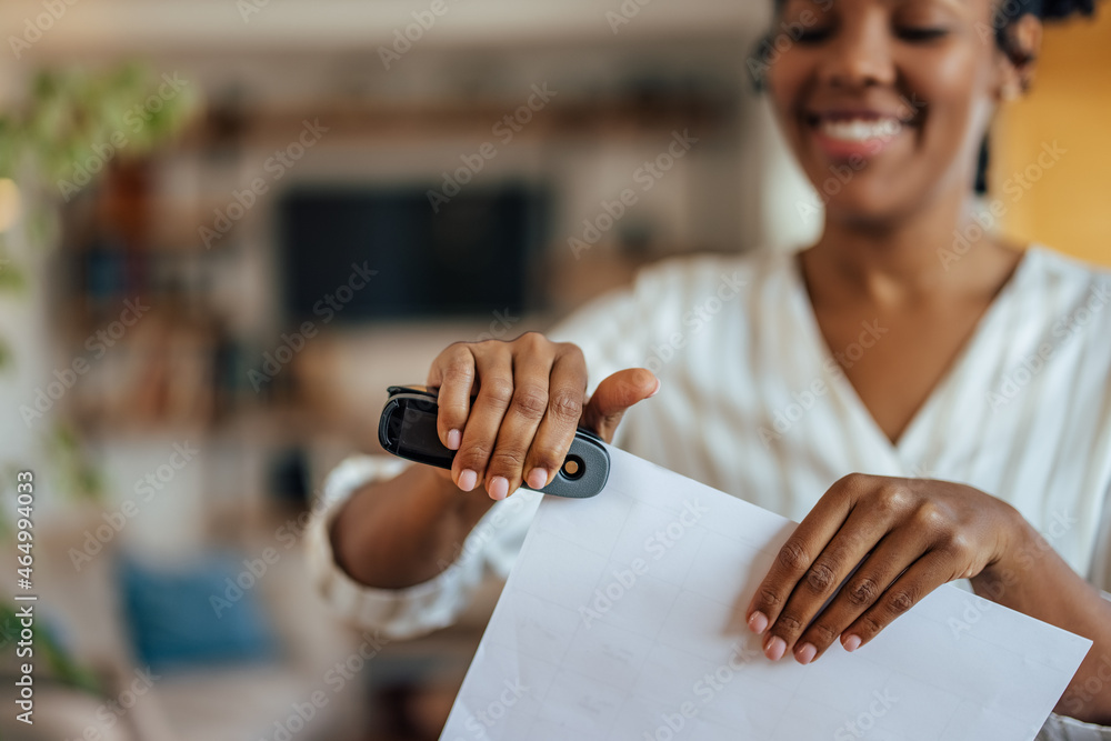 Adult woman, making sure documents are done correctly.