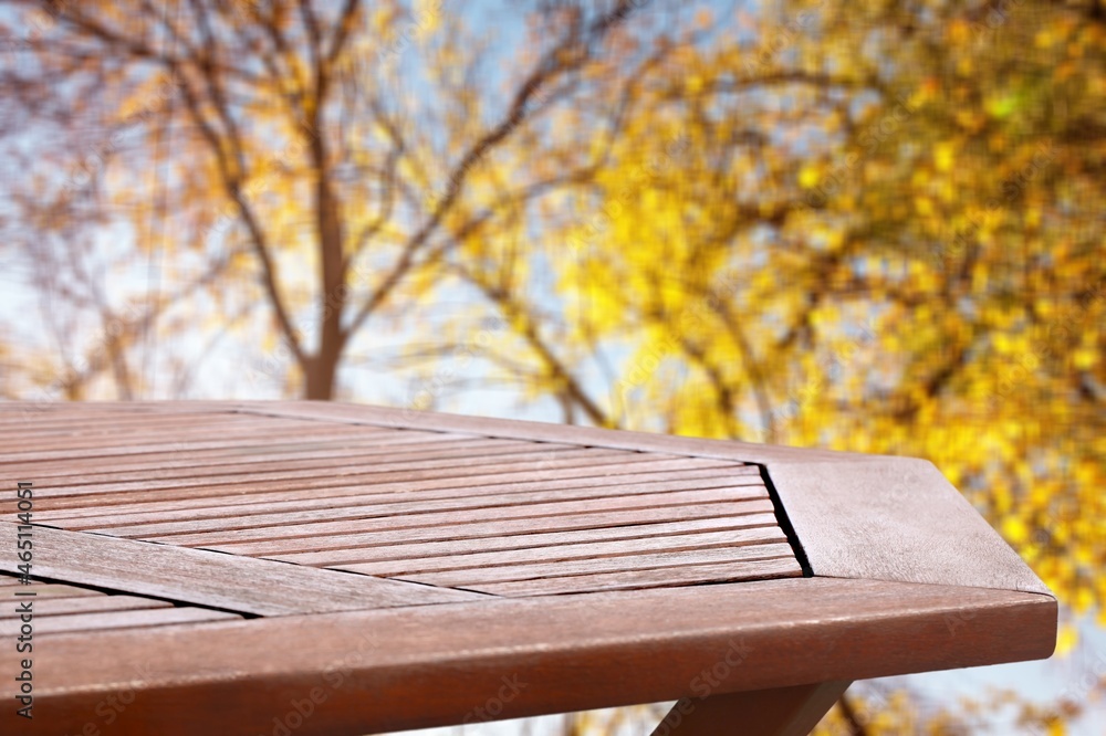 Empty brown wooden table with free space