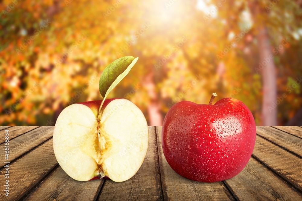 Fresh ripe apples on the wooden desk