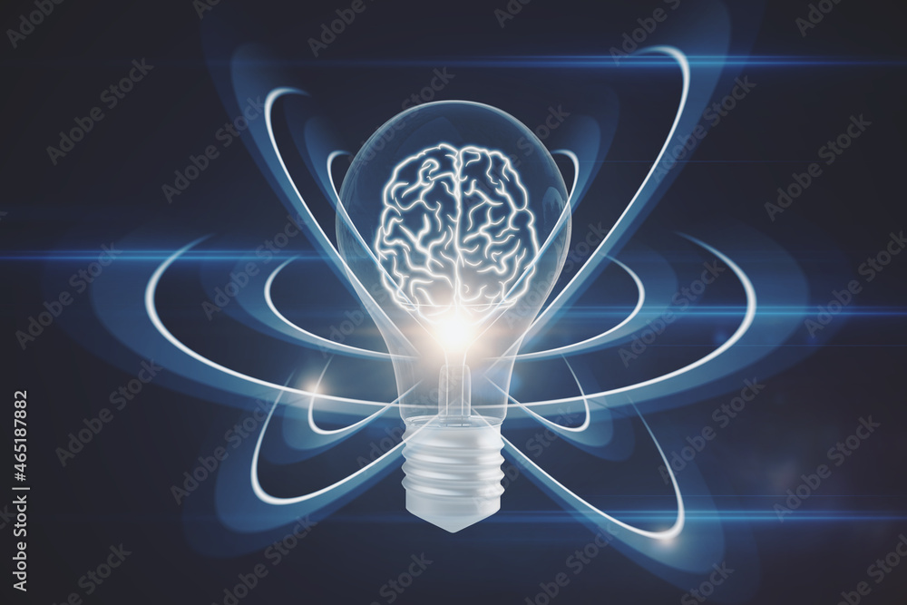 Abstract light bulb on dark wallpaper with digital brain and atom outline. Artificial intelligence, 