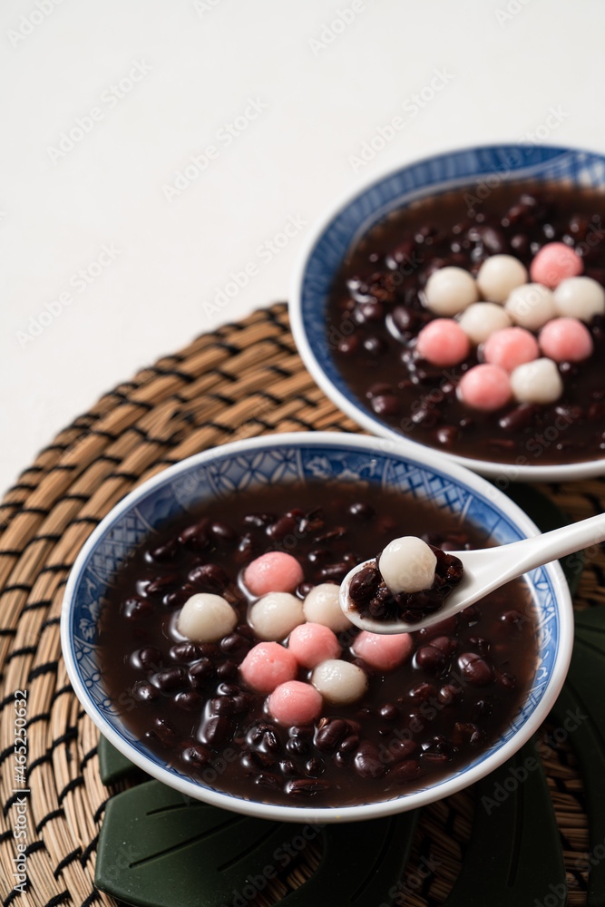 Red and white tangyuan with red bean soup.