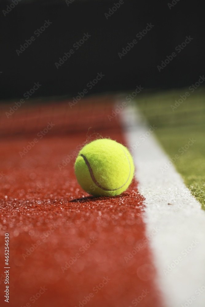 Tennis ball on a tennis court