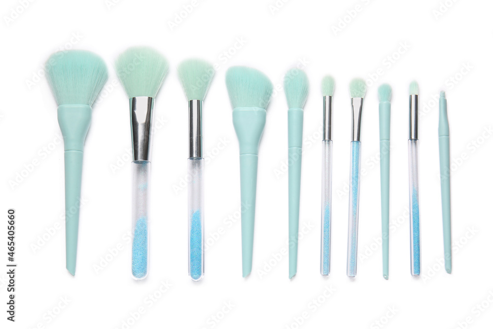 Makeup brushes on white background