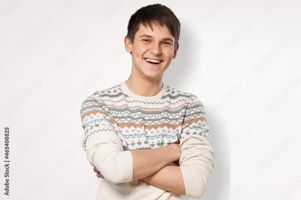 Portrait of happy, relieved, and carefree guy with big cheerful smile,