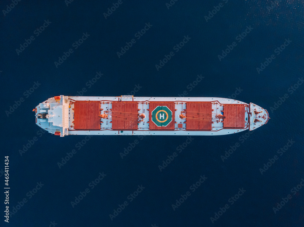 Aerial view of general cargo ship in open sea