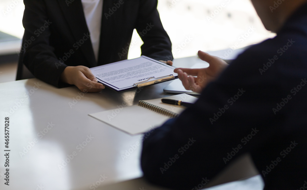 Businessmen discussing job applications and taking interviews.