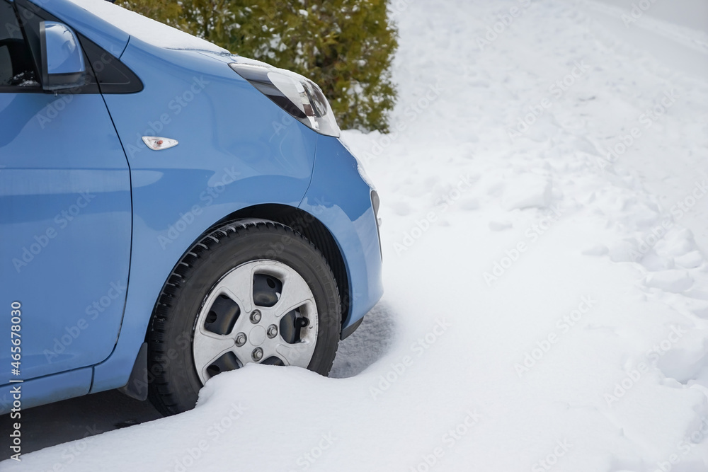 Modern car on snowy day