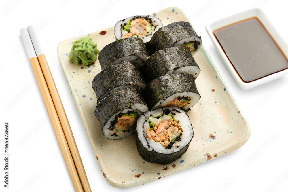 Plate with delicious sushi rolls on white background