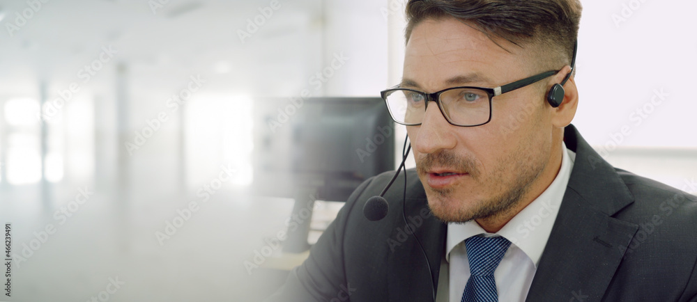 Business people wearing headset working in office to support remote customer or colleague. Call cent