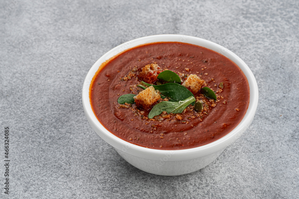 Bowl of tomato soup top view 