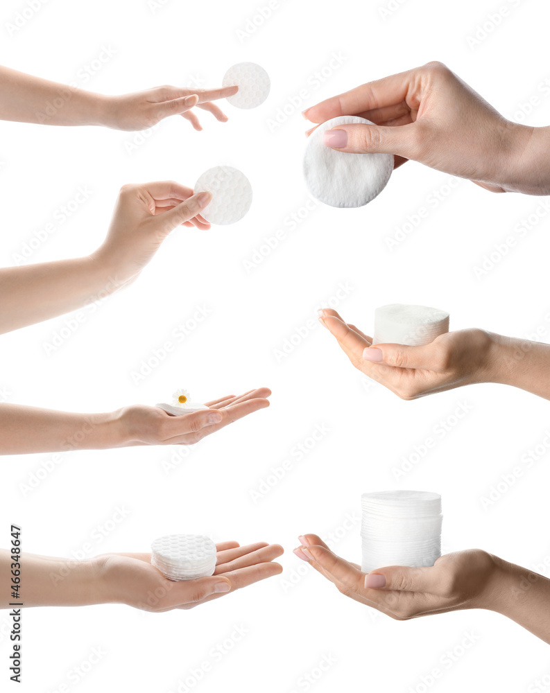 Female hands with cotton pads on white background