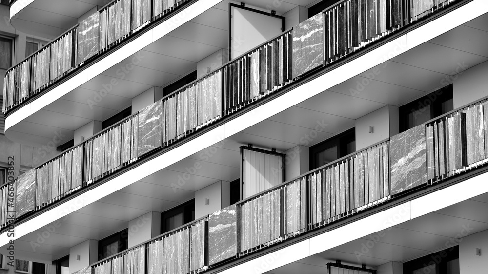 Modern apartment building. Modern urban architecture and details of building facade. Black and white