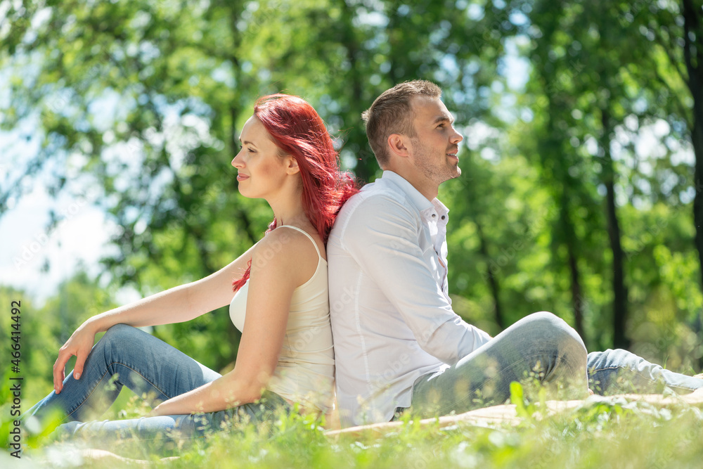 A young couple in the park.