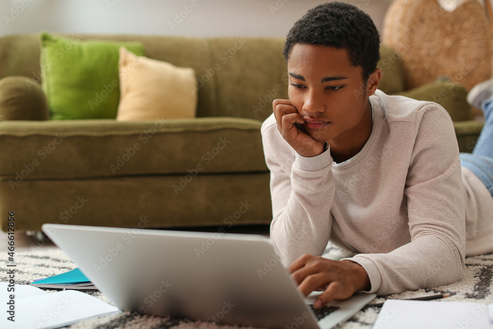 African-American student preparing for exam at home