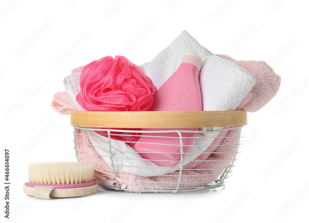 Basket with different bath supplies on white background