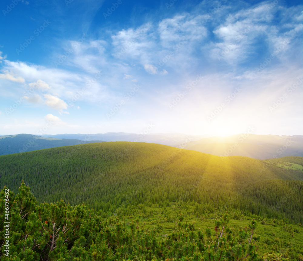 Mountain landscape on sun