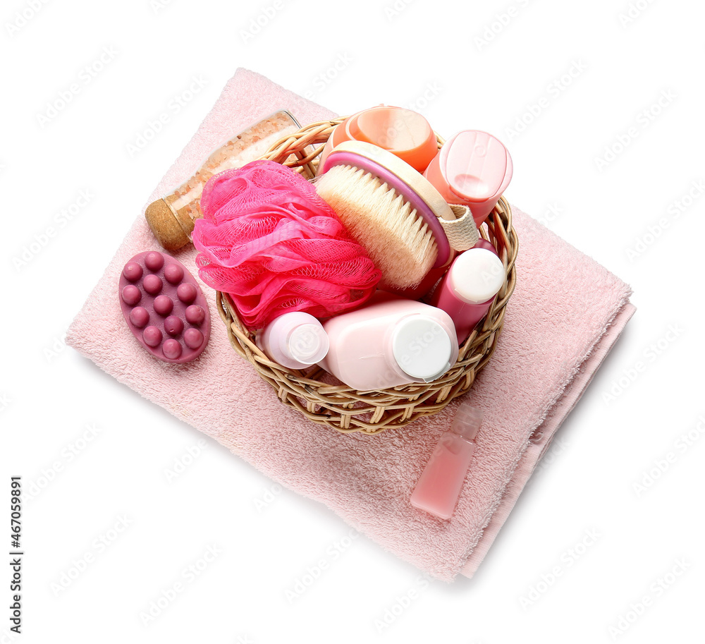 Basket with bath accessories and cosmetics isolated on white background