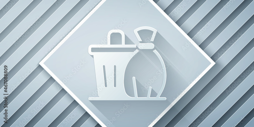 Paper cut Trash can icon isolated on grey background. Garbage bin sign. Recycle basket icon. Office 