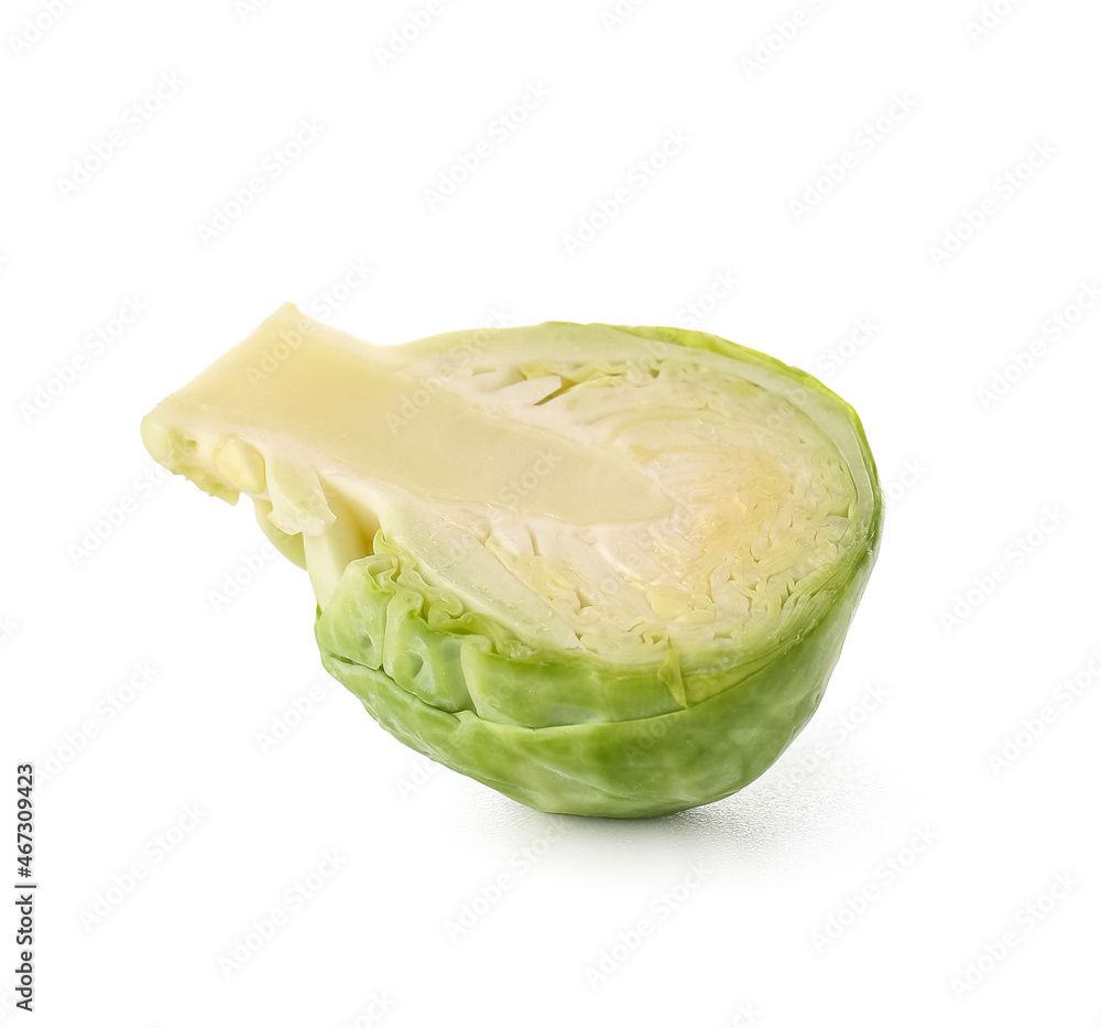 Half of fresh Brussels cabbage on white background