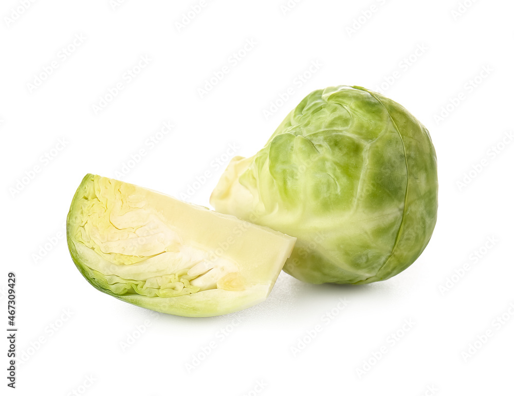 Cut ripe Brussels cabbage on white background