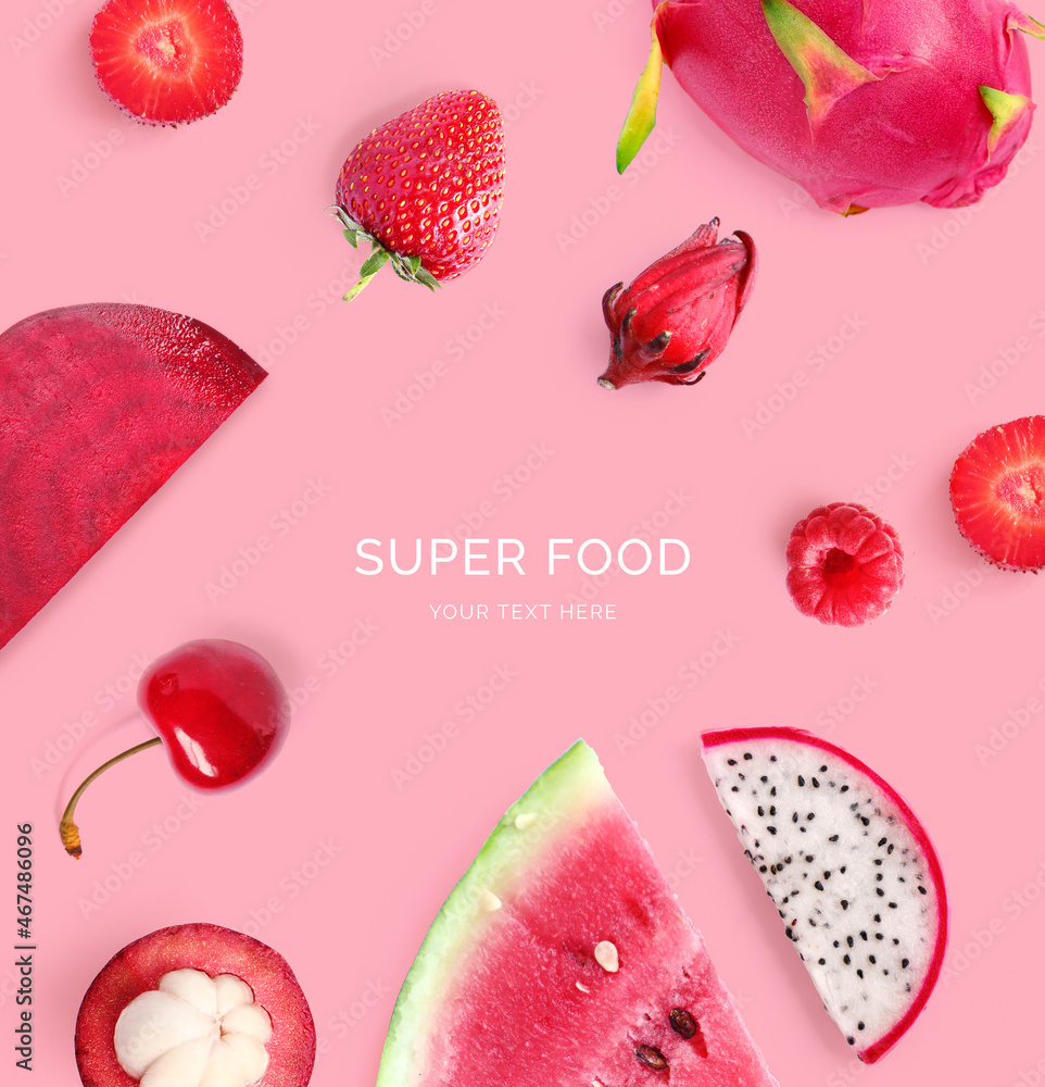 Creative layout made of  strawberry, raspberry, watermelon, dragon fruit, cherry and mangosteen  on 