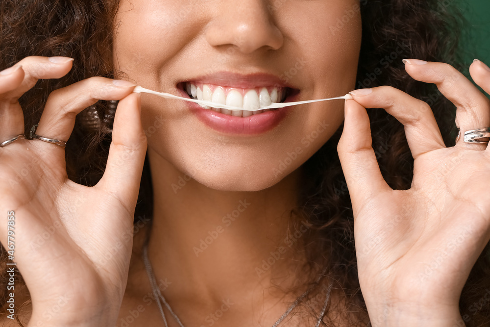 African-American woman with chewing gum, closeup