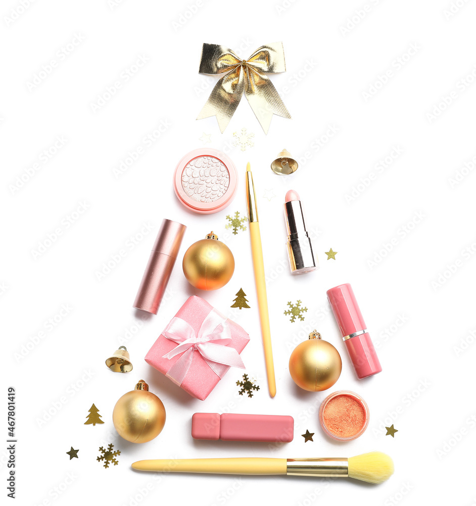 Beautiful Christmas tree made of makeup cosmetics and decor on white background