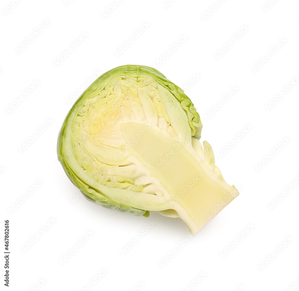 Half of raw Brussels cabbage on white background