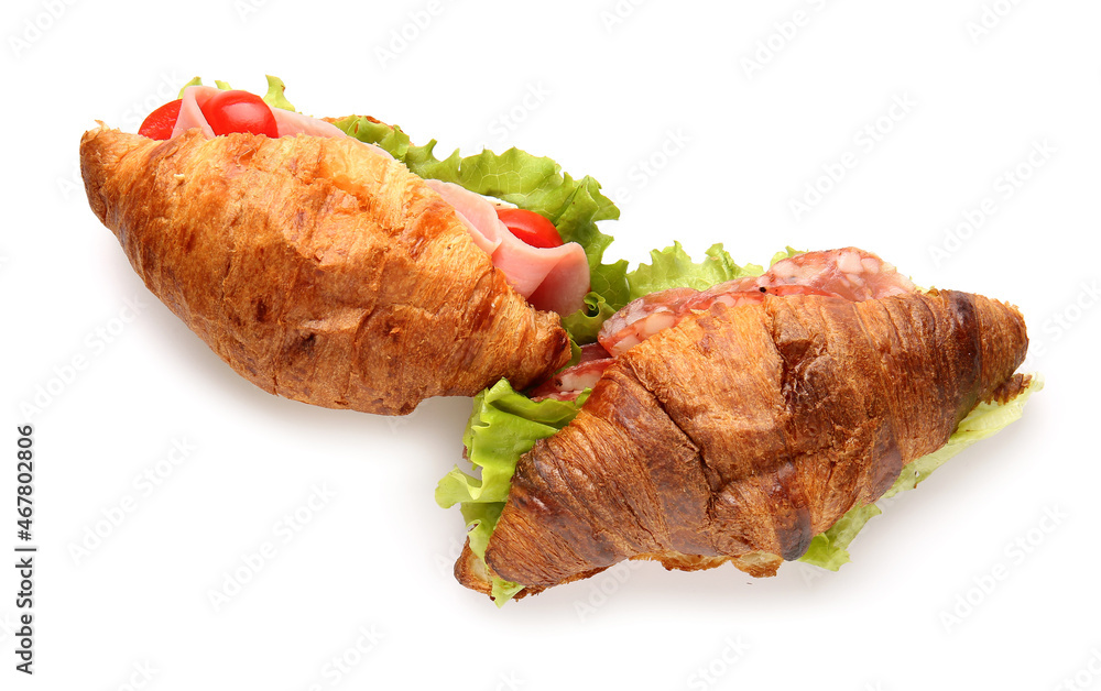 Delicious croissant sandwiches on white background