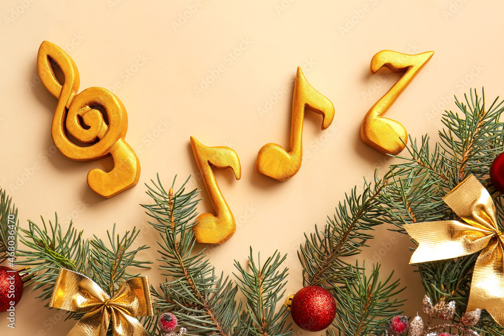 Note signs with Christmas decor and fir branches on beige background