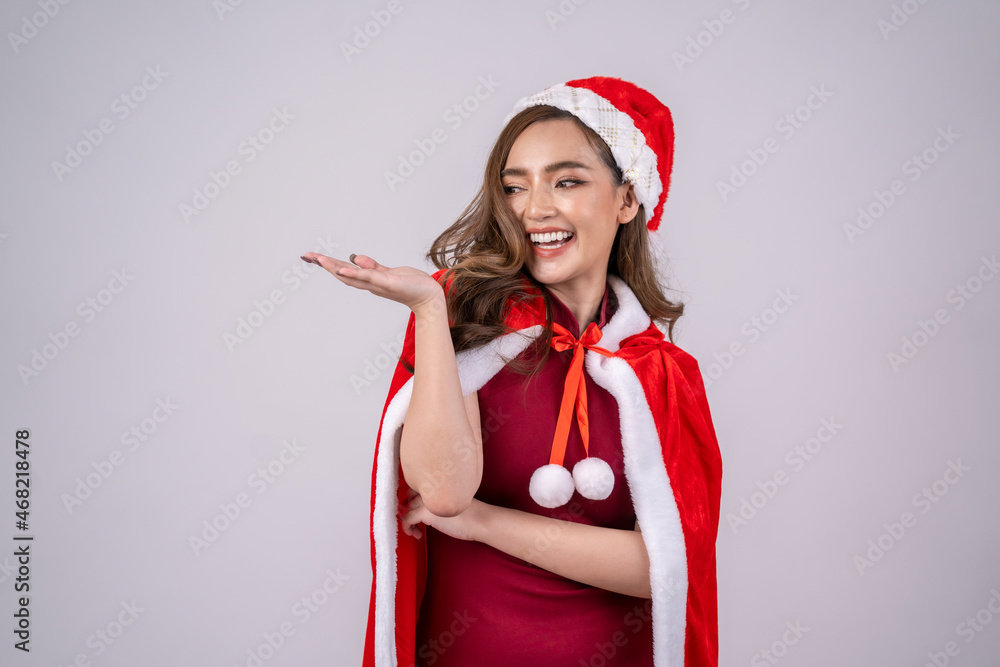 Portrait of attractive Asian wearing santa costume,Winter holidays and people concept.