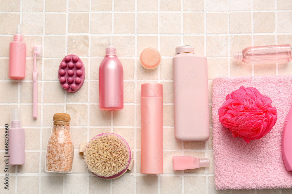 Bath supplies on light tile, closeup