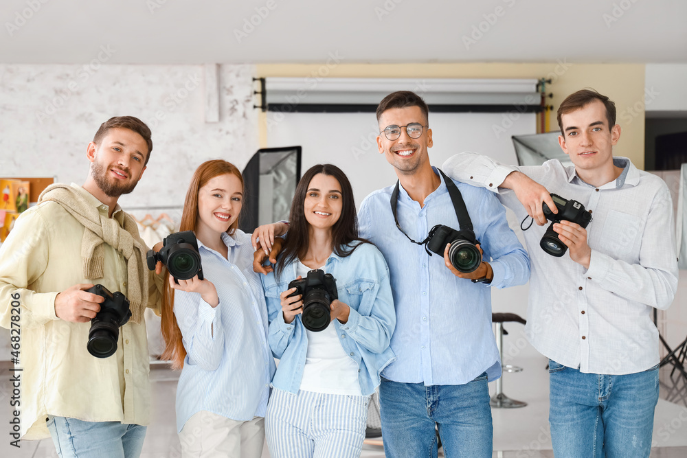 Group of photographers during classes in studio