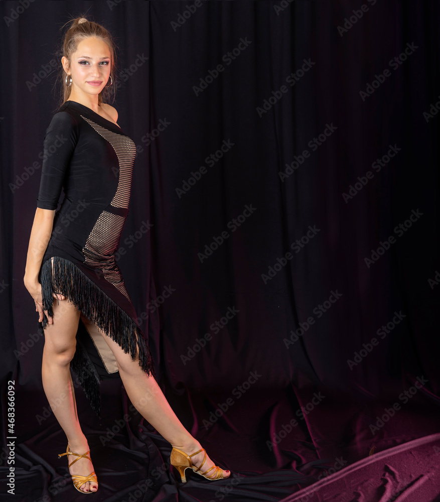  Dancer dressed in black professional cloth.