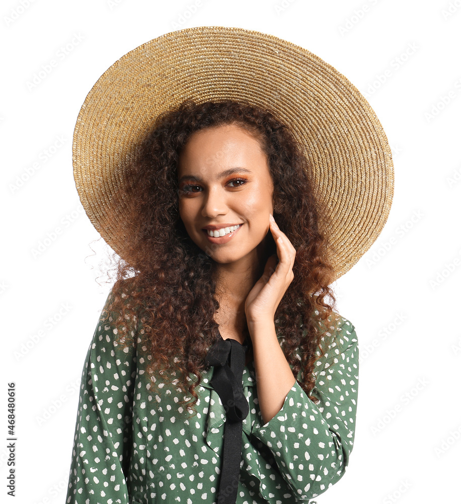 Beautiful African-American woman in stylish hat on white background