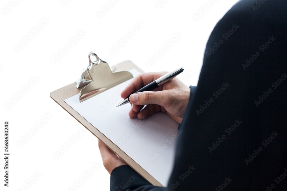 Person Taking Notes on a Clipboard