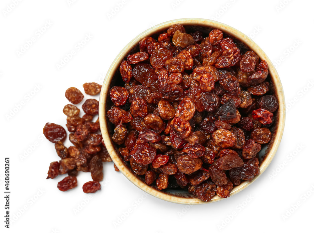 Tasty raisins in bowl on white background