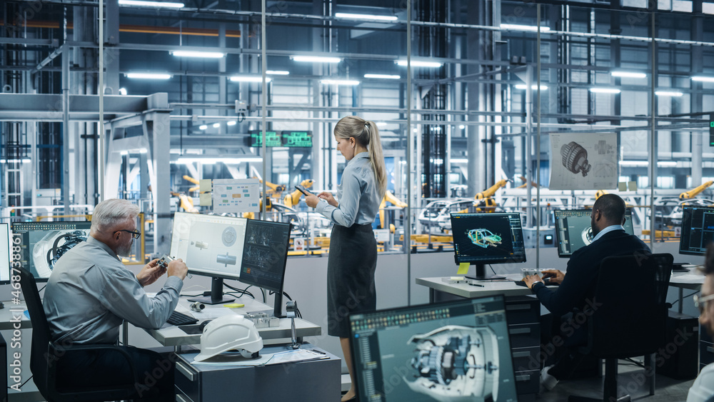 Car Factory Office: Team of Automotive Engineers Working, Using Computers to Design Advanced 3D Mode