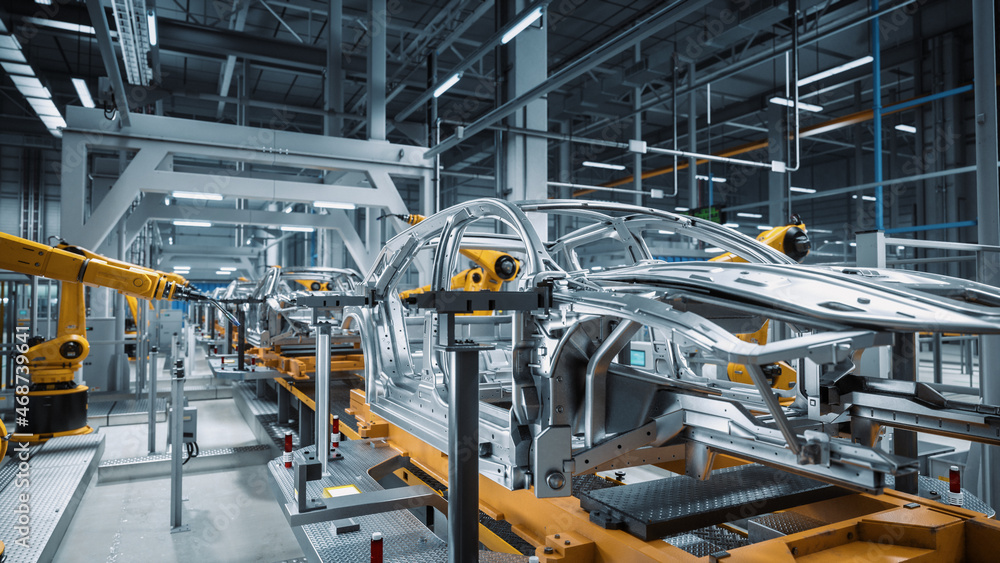 Car Factory 3D Concept: Automated Robot Arm Assembly Line Manufacturing High-Tech Green Energy Elect