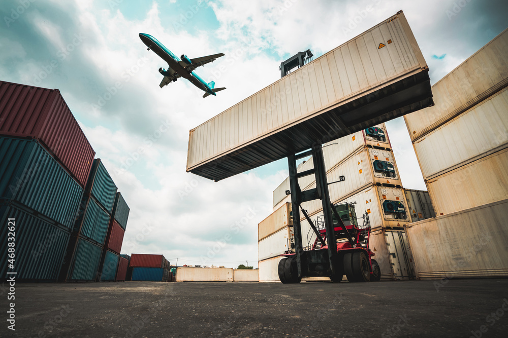 Cargo container for overseas shipping in shipyard with airplane in the sky . Logistics supply chain 