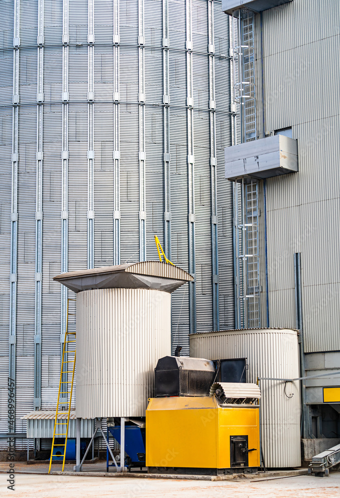 Metallic industry warehouse architecture. Large metal factory buildings.