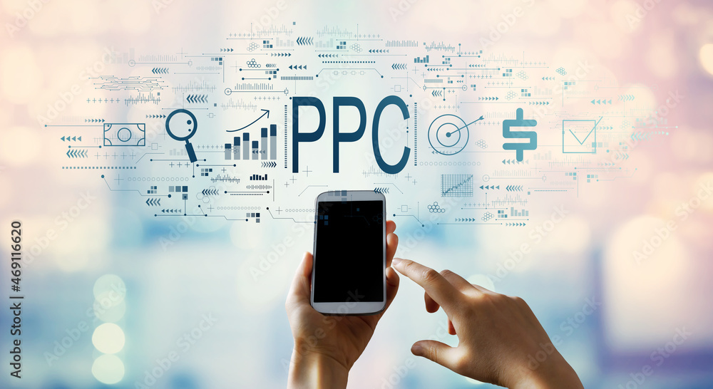 PPC - Pay per click concept with person using a smartphone